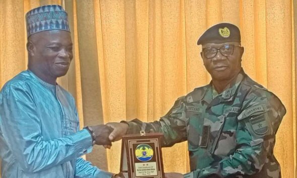 Chief of Army Staff, Major General Lorance Gbetanu (Right) and Northern Regional Minister (Left)
