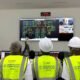 Members of Parliament's Energy and Mines Committee in the control room of the 50MW Yendi solar plant